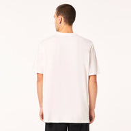 Person wearing a plain white t-shirt on a white background