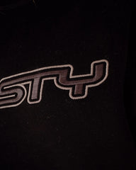 Close-up of a logo on a black background