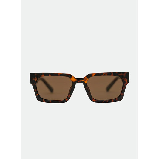 Sunglasses with tortoiseshell frame and brown lenses on a white background