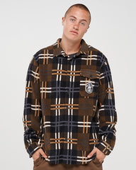 Man wearing a plaid shirt with a logo on a white background