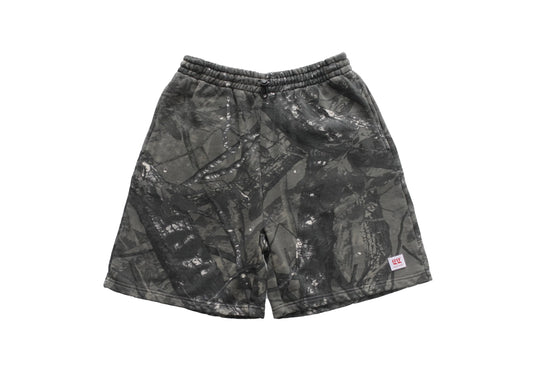 Black and gray camouflage shorts on a white background