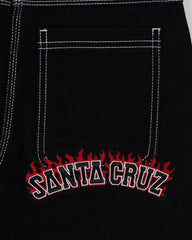 Black pants with 'Santa Cruz' logo featuring flames on a pocket.