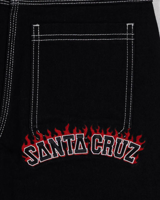 Black pants with 'Santa Cruz' logo featuring flames on a pocket.