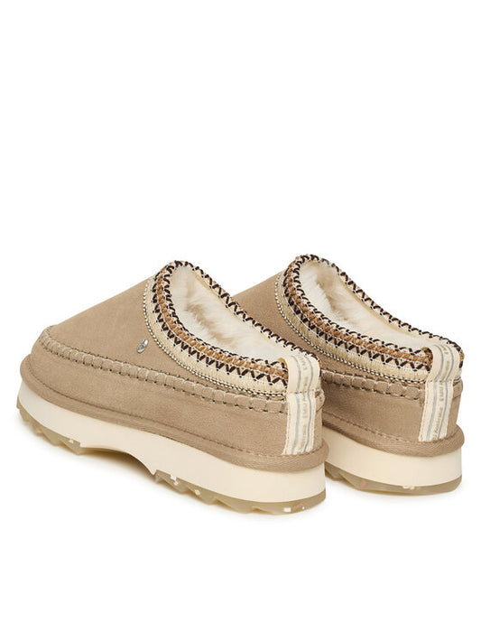 Pair of tan slip-on shoes with white soles on a white background