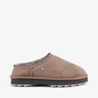 Brown slipper with decorative trim on a white background