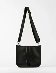 Black handbag with a strap on a white background