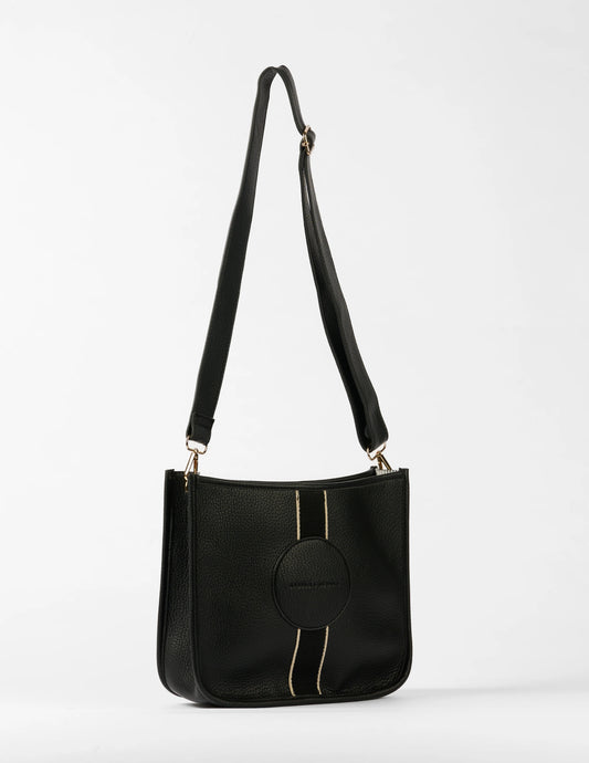 Black handbag with a strap on a white background