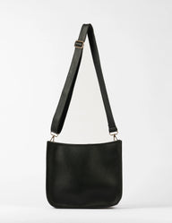 Black leather shoulder bag with a strap on a white background