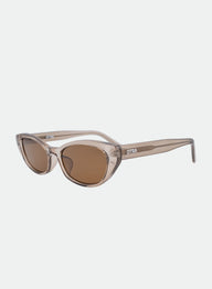 Sunglasses with a transparent frame and brown lenses on a white background