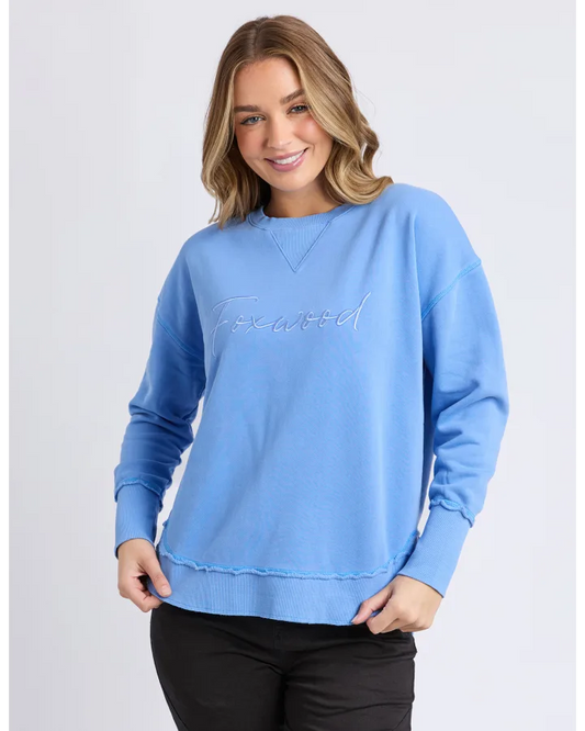 blue crew sweatshirt with foxwood logo on front chest 