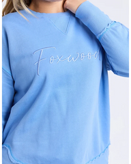 blue crew sweatshirt with foxwood logo on front chest 