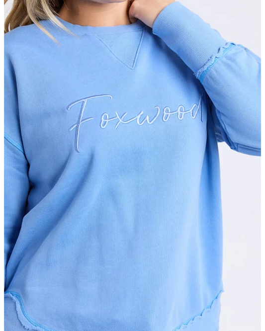 blue crew sweatshirt with foxwood logo on front chest 