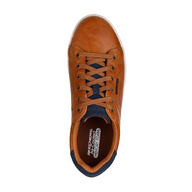 Brown sneaker with navy accents on a white background