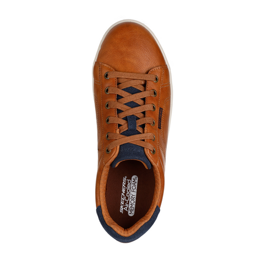 Brown sneaker with navy accents on a white background