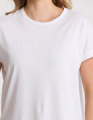 white tee with stella + gemma logo on front