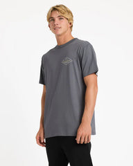 Man wearing a gray t-shirt with a logo on a white background