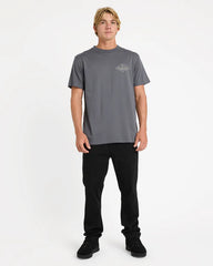 Man wearing a gray t-shirt with a logo on a white background