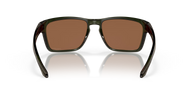 Sunglasses with brown lenses and black frame on a reflective surface