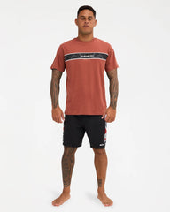 burnt orange tee with logo on chest with pattern 