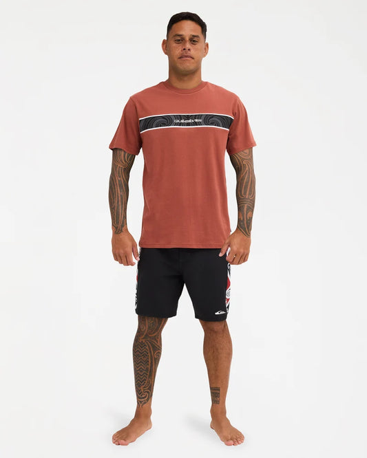 burnt orange tee with logo on chest with pattern 