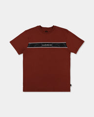 burnt orange tee with logo on chest with pattern 