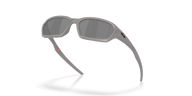 Gray sunglasses with a reflective surface on a white background