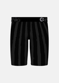 Black boxer briefs with vertical textured stripes and a black elastic waistband featuring the 'ethika' logo on a light gray background.