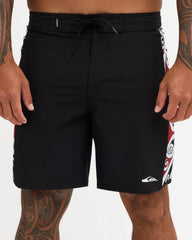 Black boardshort with Maori design along the side of short 