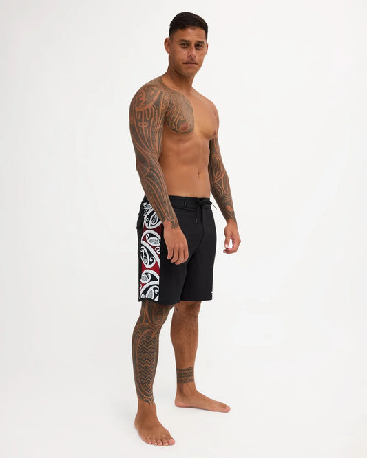 Black boardshort with Maori design along the side of short 