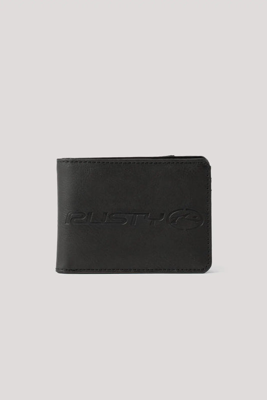 A black leather bifold wallet with an embossed 'RUSTY' logo and circular emblem on the front, displayed against a solid light gray background.