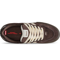 Brown sneaker with white laces on a white background
