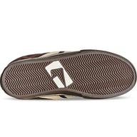 Close-up of a shoe sole with a brand logo on a white background