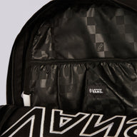 Black backpack with Vans logo on a light gray background