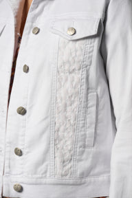Close-up of detailing on Vassalli White denim jacket with button details