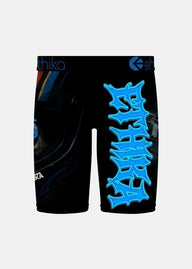 Black athletic shorts featuring a graphic print of a skull in a racing helmet with blue glowing eyes and a trophy cup, with the brand name 'ethika' printed on the waistband and leg.