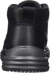 Black leather boot with a focus on the sole on a white background