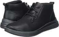Black lace-up boots with a white background