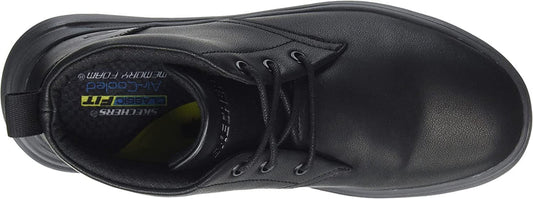 Black safety shoe with visible brand name on a white background