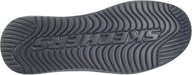 Close-up of a Skechers shoe sole with brand name.
